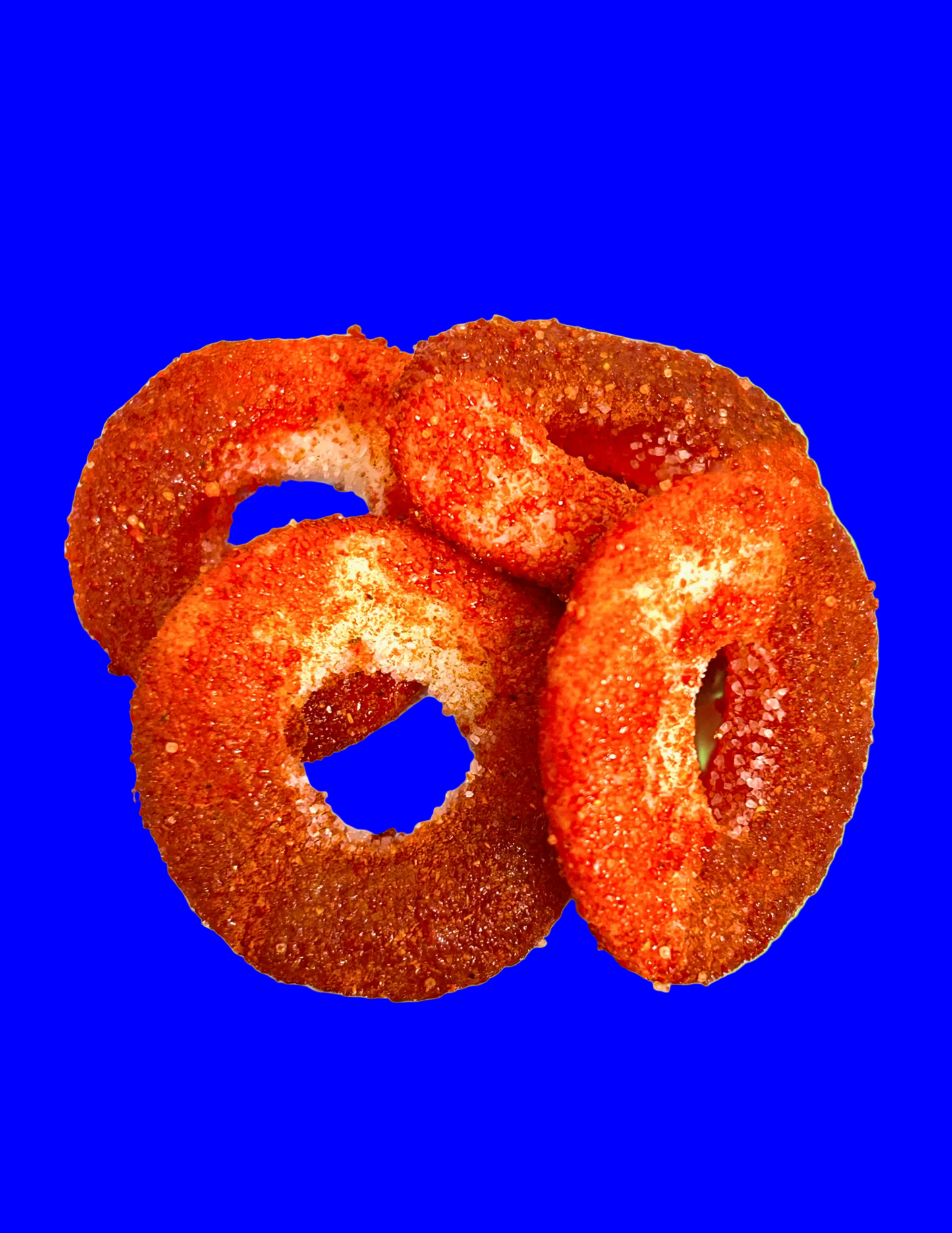 Watermelon rings covered in chamoy and chili