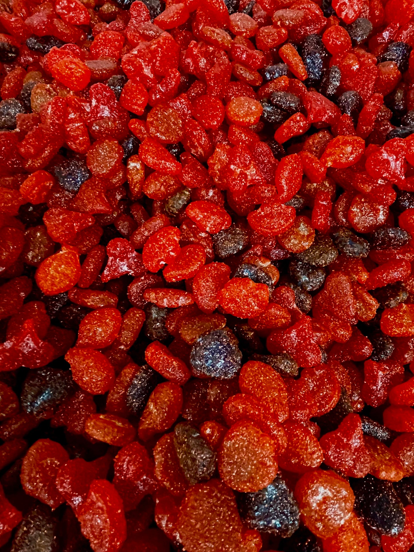 close up of jolly ranchers covered with chamoy and chili 