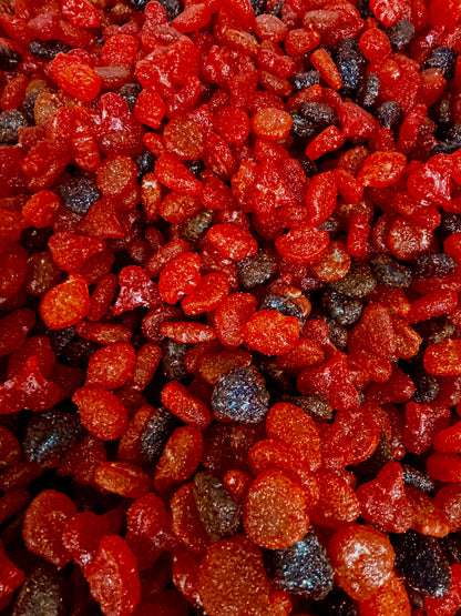 close up of jolly ranchers covered with chamoy and chili 