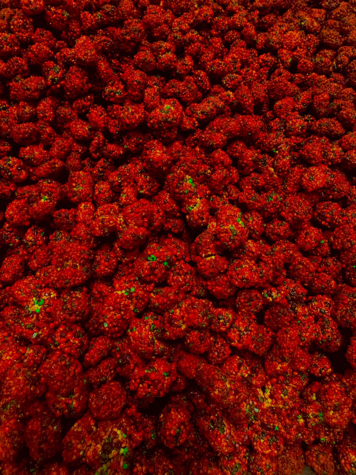 Close up of nerds covered in chamoy and chili 