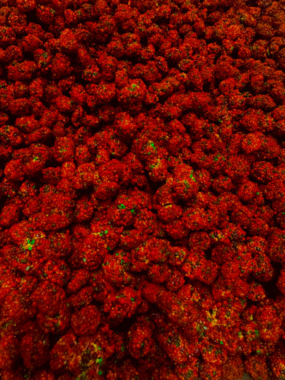 Close up of nerds covered in chamoy and chili 